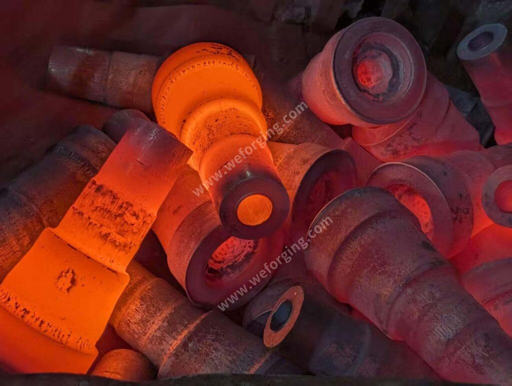 Custom carbon steel forgings produced for OEM applications with controlled geometry and machining allowance