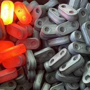 Hot and cold forged link arms showing forging temperature and grain refinement