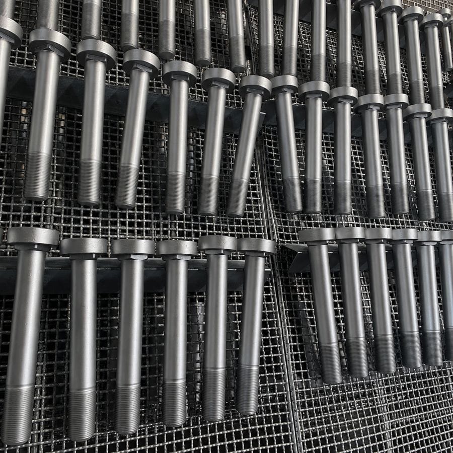 Nitrided steel shafts and forged components with improved surface hardness, wear resistance, and fatigue strength