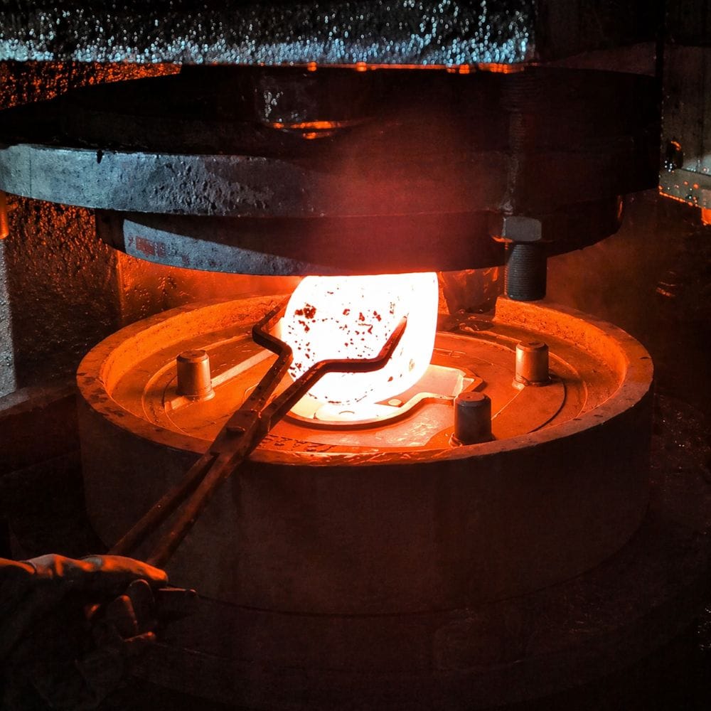 closed die forging process with hot steel billet forming in precision die by Weforging