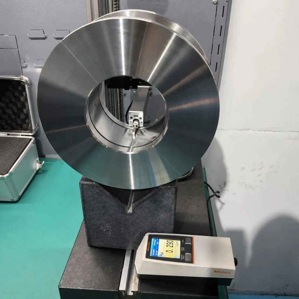 Mitutoyo surface roughness tester measuring Ra value on precision CNC machined component