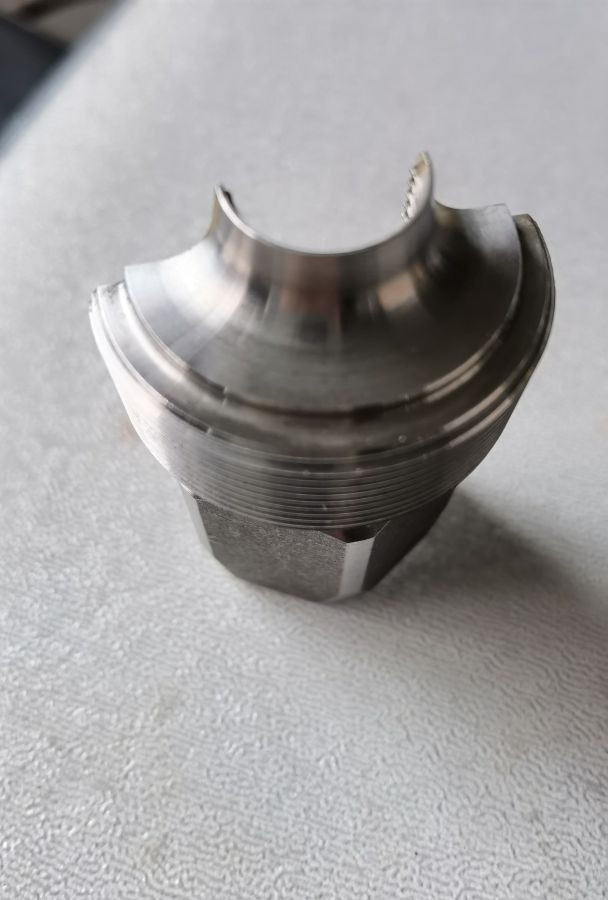 Cutaway Drive Nut showing machined threads, wall thickness and internal transitions