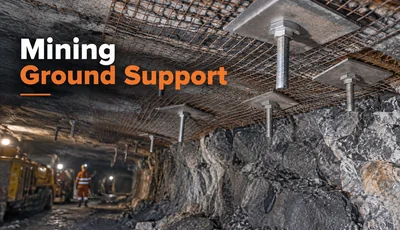Mining ground support system with roof bolts, steel mesh and bearing plates in an underground mine