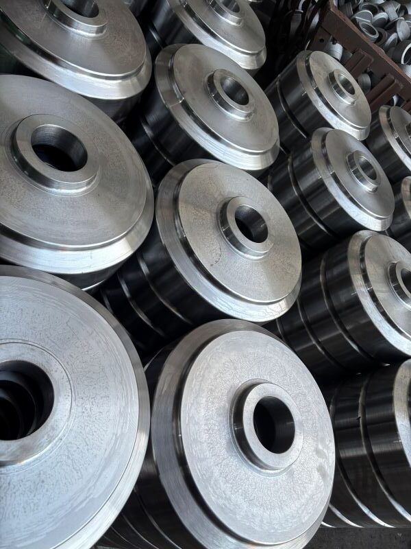 Forged internal gear blanks after normalizing and rough machining, before internal gear cutting and spline broaching