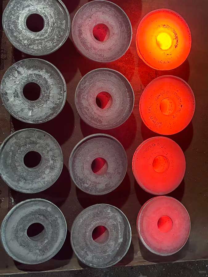 Steel forged blanks for custom robot rotor components at different cooling stages
